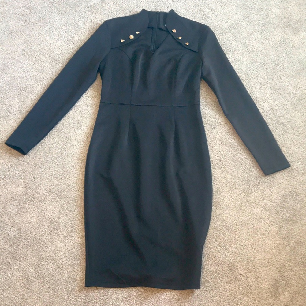 Color is black with gold buttons